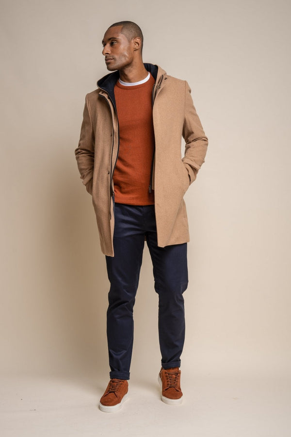 Add an essential piece to your winter wardrobe this season with our stylish.  Its dark colours and slimming fit will not only keep you warm this winter it will also keep you looking stylish.