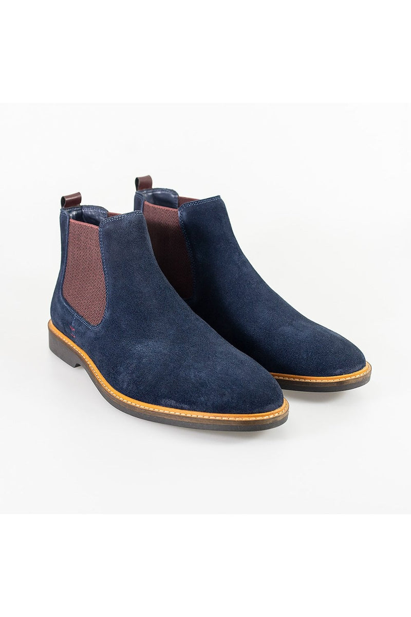 Very lightly scuffed for a lived-in look with elasticated side panels for an easy slip on, our stylish Arizona navy boots are perfect for that winter wardrobe update.
