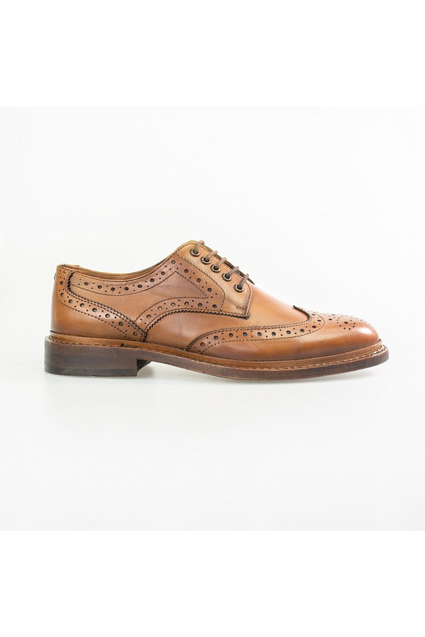 Welcome to Cavani fine tan leather hand crafted Brogues - the classic English shoe. Cavendish are a timeless investment and a stylish essential. This staple features a lace up front with leather sole Goodyear welt for your best weekend finery. Finished with a low heel its safe to assume you'll be lacing these up with suits for years to come.