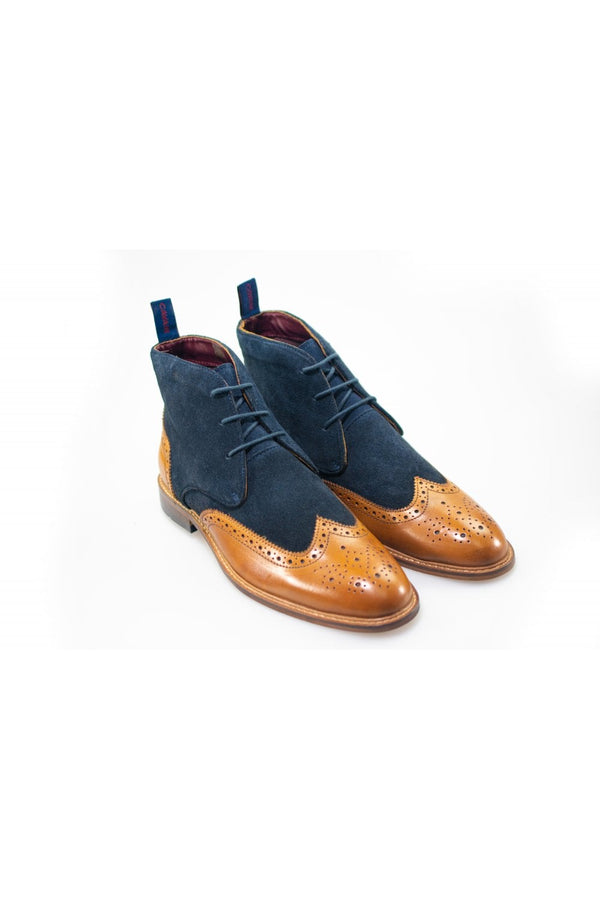 A sophisticated take on a classic style, these Cavani Mortimer navy shoes are fashioned from soft brush suede to complete any look! Connick Boots - Get them while they're hot