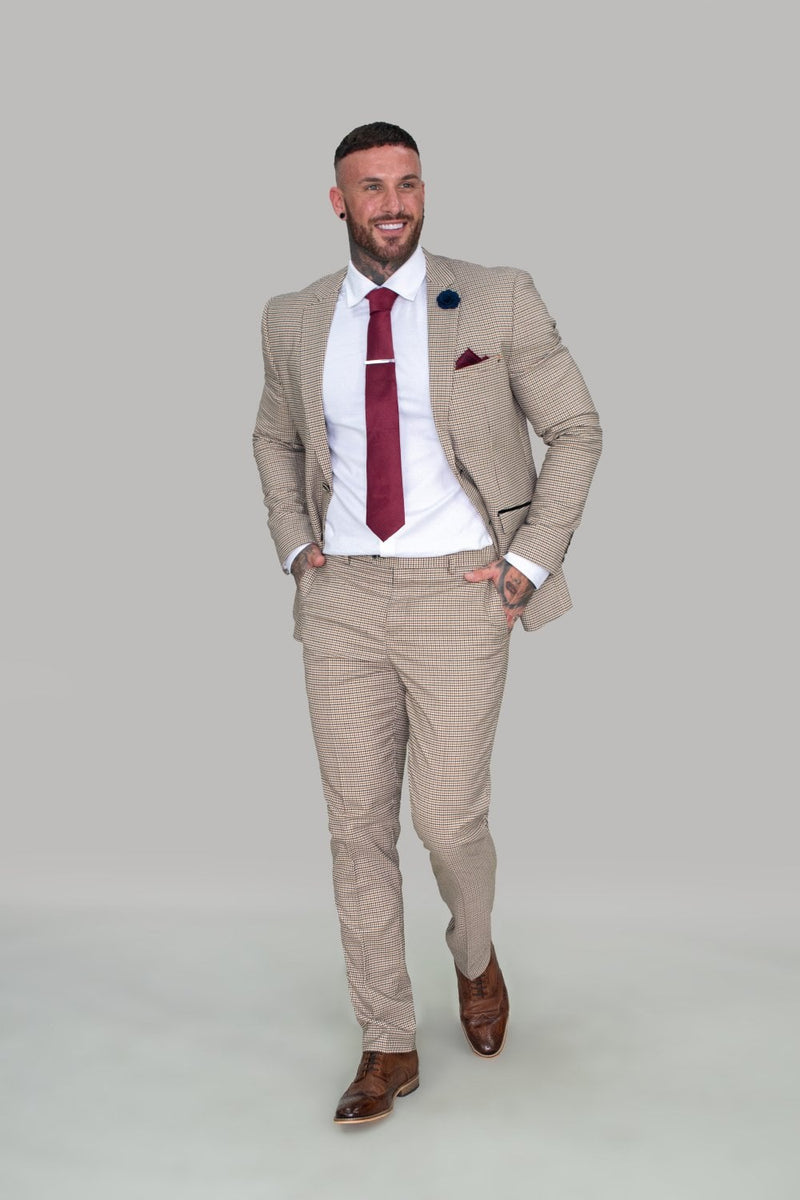 Elwood is the perfect suit for your wedding. Neutral colours allow you to add whatever colour you want to make it unique to you. Make sure you have the perfect wedding suit for your wedding day and make the memories that will last forever.  Features 65% Polyester, 30% Rayon & 5% spandex 2 buttons and 2 internal pockets Slim fitting Model Measurements Our Model is in a size 42 chest with 32 trousers standing at a height of 6 foot | Office Wear