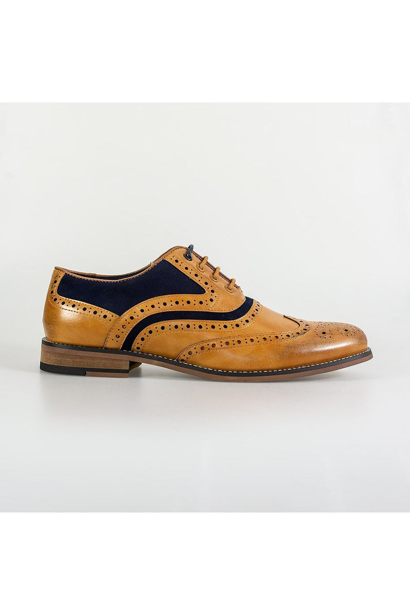 They say you can tell a lot from a gentleman's shoes, so why not make an impression with the Ethan black, brogue style.  