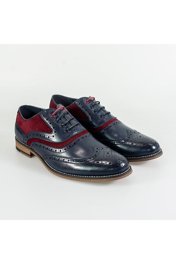 They say you can tell a lot from a gentleman's shoes, so why not make an impression with the Ethan black, brogue style.  