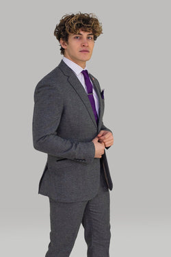 Another winning style from House Of Cavani. Our lightweight, wool blended Martez three-piece is a timeless investment that will style you across the seasons. With its colourful spotted inner lining, this House of Cavani suit will take you to the top of fashion. Stylist Tips Pair with the orange dot tie set to complete the look. Features 90% Polyester, 10% Wool 2 buttons and 2 internal pockets Slim fitting - Party Wear | Office Wear