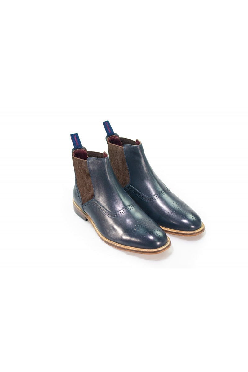 A sophisticated take on a classic style, our Moriarty Navy Chelsea boots will work perfectly with both formal and off-duty attire as a year-round wardrobe essential. Also available in Tan and Wine