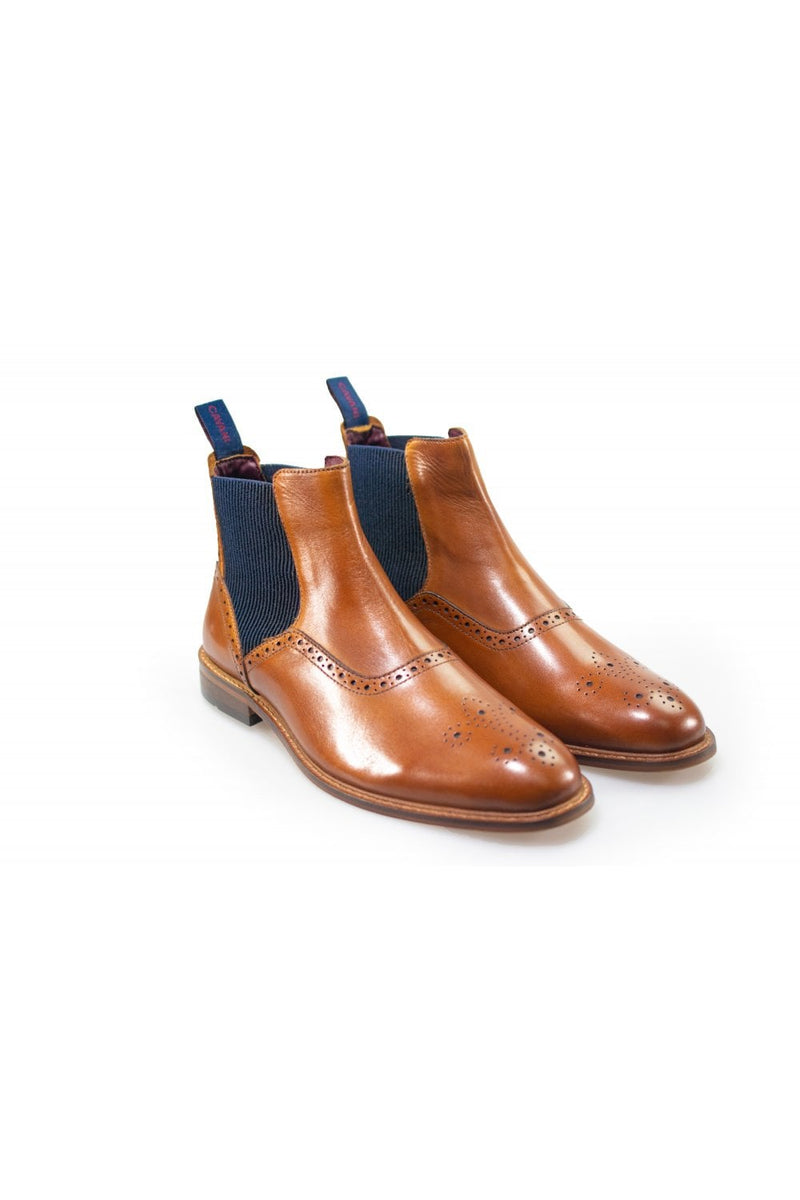A sophisticated take on a classic style, our Moriarty Navy Chelsea boots will work perfectly with both formal and off-duty attire as a year-round wardrobe essential. Also available in Tan and Wine
