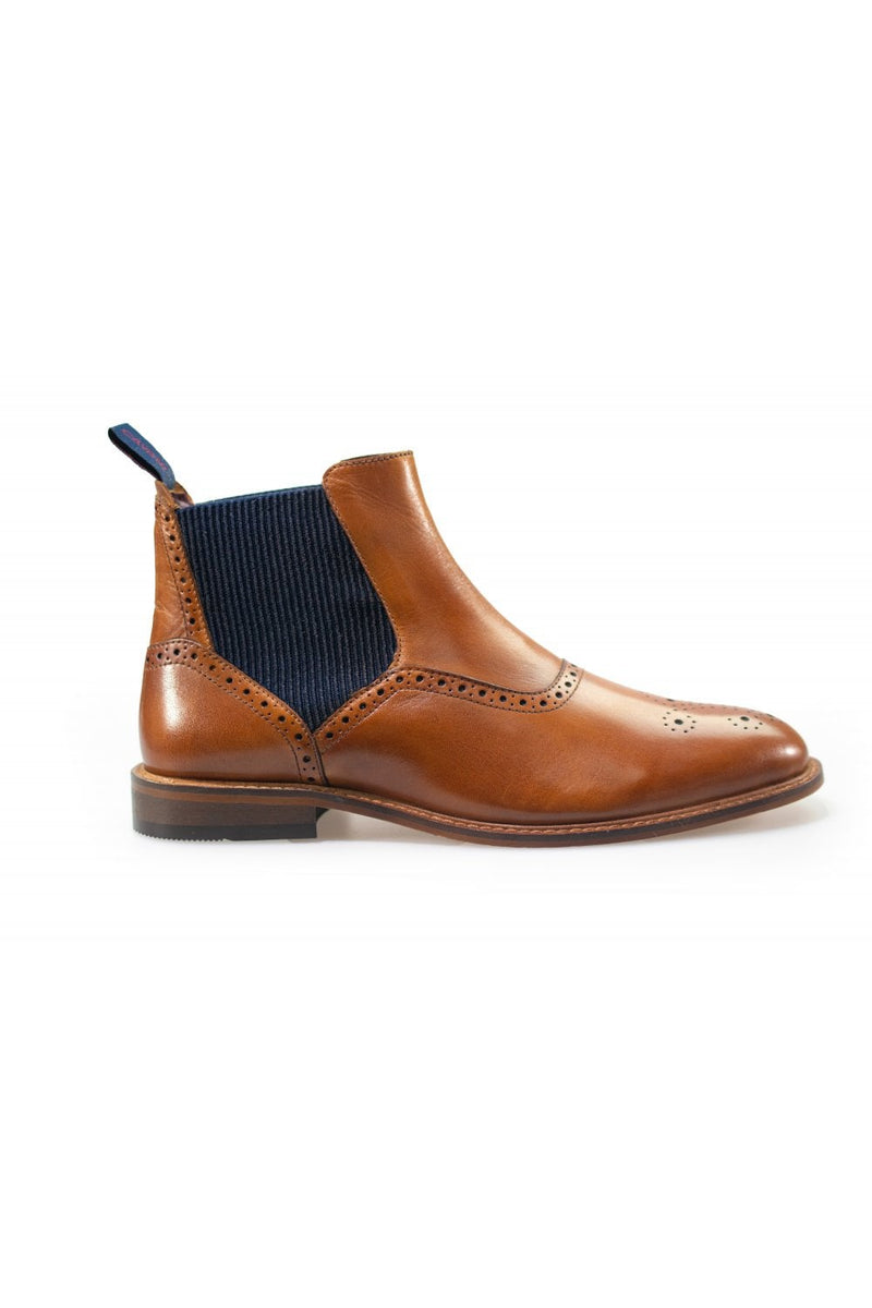 A sophisticated take on a classic style, our Moriarty Navy Chelsea boots will work perfectly with both formal and off-duty attire as a year-round wardrobe essential. Also available in Tan and Wine