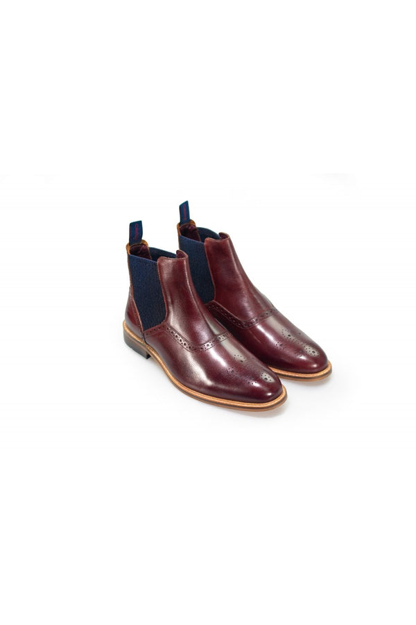 A sophisticated take on a classic style, our Moriarty Navy Chelsea boots will work perfectly with both formal and off-duty attire as a year-round wardrobe essential. Also available in Tan and Wine