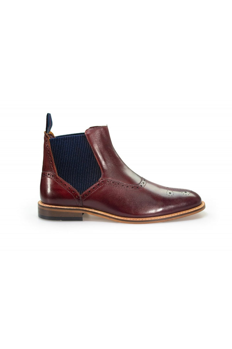 A sophisticated take on a classic style, our Moriarty Navy Chelsea boots will work perfectly with both formal and off-duty attire as a year-round wardrobe essential. Also available in Tan and Wine