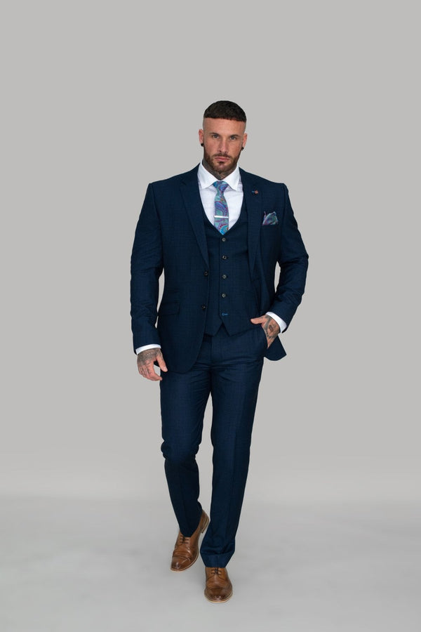 The perfect choice for that day to day wear. The plain colours give a no nonsense style and get you straight to business. Wear it with or without the waistcoat to transition from a day look to a night look. The slim fit will help you exude confidence and style.- Party Wear | Office Wear