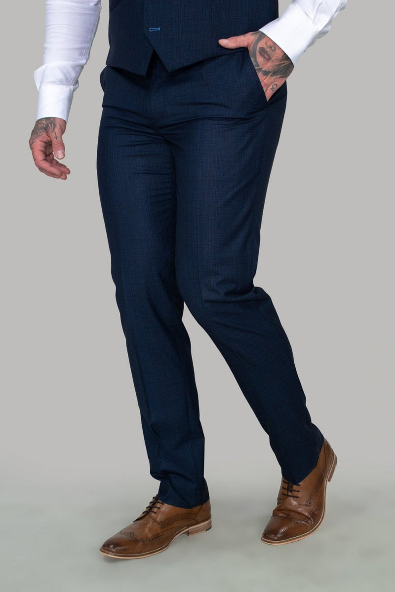 A sleek modern design, style with a smart oxford shirt or get the entire Seeba three piece in our suit collection.  Style  Seeba Material 80% Polyester 20% Rayon Colour Navy  Fitting Slim Fit - Party Wear :- Office Wear