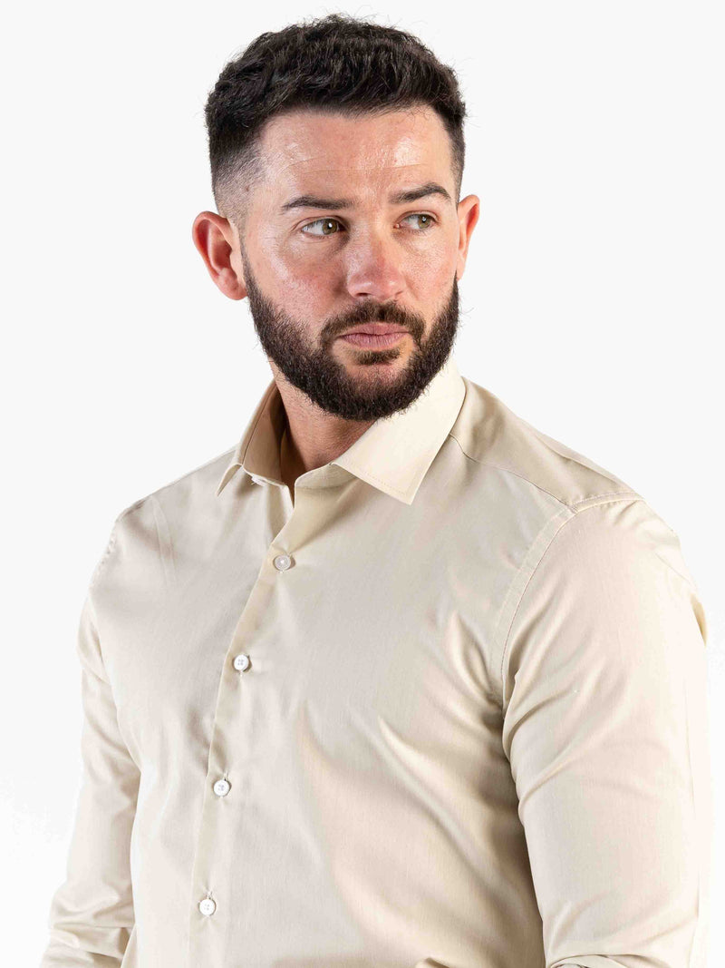 Add a subtle edge to your look with this long-sleeved beige shirt. This staple is cut to a classic fit with a spread collar and full button fastening to the front.