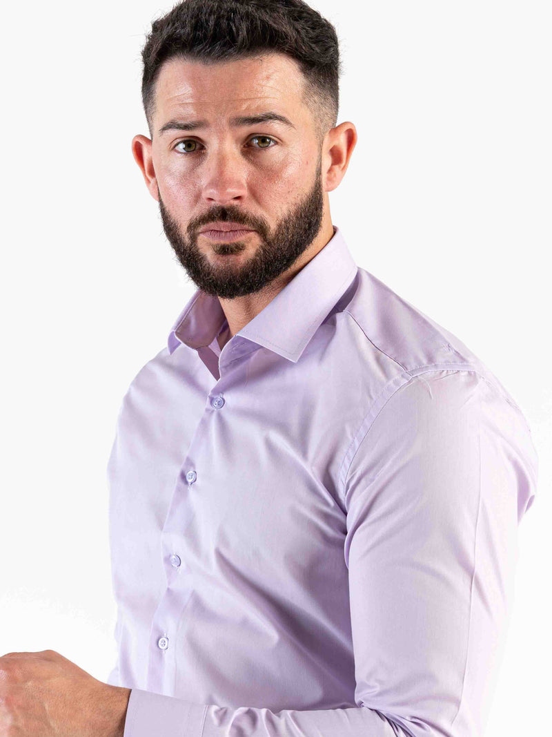 Our stylish classic shirt in lilac is a tailoring staple. Its crafted from breathable fabric to ensure all day comfort. Pair yours with formal trousers and a blazer for an effortless look.     Features:  Classic fit Spread collar Single cuff Full button fastening to the front Long sleeve