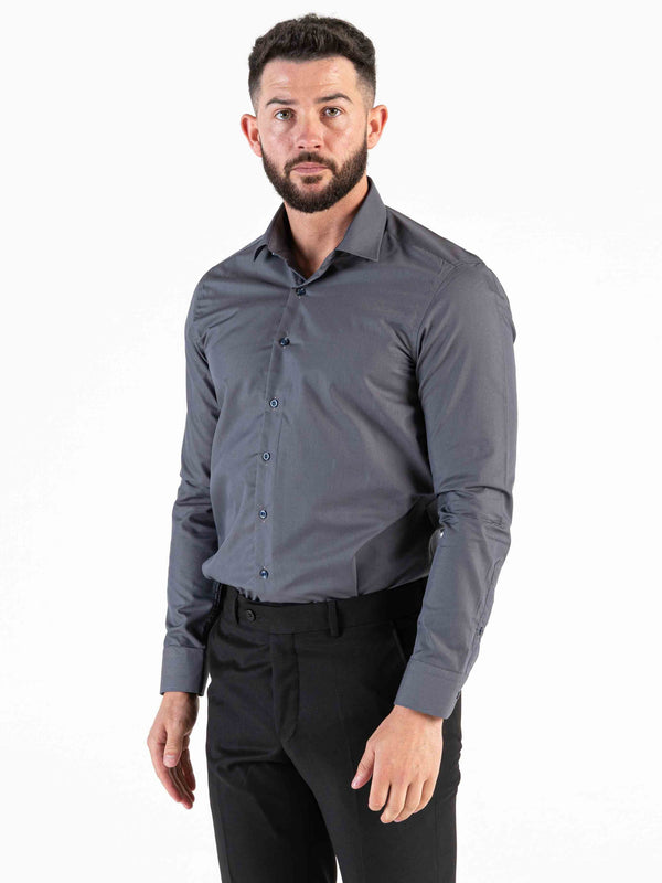 Step away from the average white shirt and add a subtle edge with the classic dark grey. This staple is cut to a classic fit featuring long sleeves and a spread collar.   