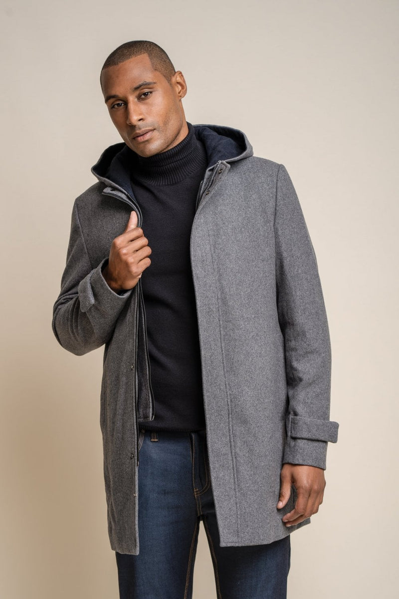 Add an essential piece to your winter wardrobe this season with our stylish.  Its dark colours and slimming fit will not only keep you warm this winter it will also keep you looking stylish.